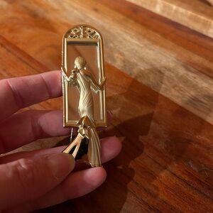 Cute art nouveau pin.